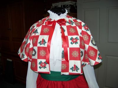 Dicken&#39;s Christmas Caroler cape Red and cream and green checked cape reversible cream solid on back one size fits most Handmade USA