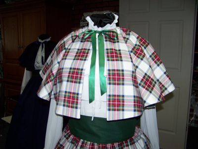 Ladies Dickens Outfit, Mrs. Claus costume Long drawstring plaid SKIRT and cape or sash one size fits most Medium weight flannel cotton plaid Handmade in the USA