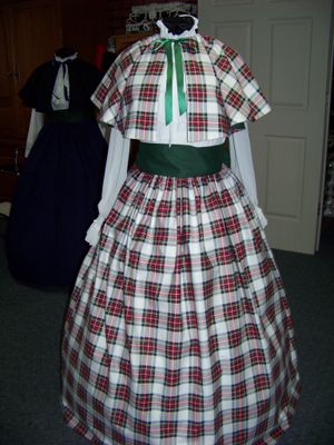 Ladies Dickens Outfit, Mrs. Claus costume Long drawstring plaid SKIRT and cape or sash one size fits most Medium weight flannel cotton plaid Handmade in the USA