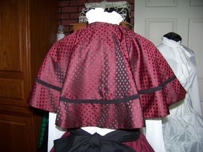Ladies Dickens Outfit, Civil War costume Cranberry Long cotton blend drawstring SKIRT and Cranberry and black plaid cape with black sash one size fits most Handmade in the USA