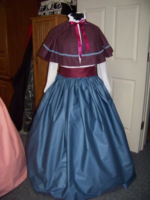 Dickens Civil War Ladies Slate blue solid Long Skirt and burgundy Sash with Burgundy calico Cape one size fits most. Handmade USA