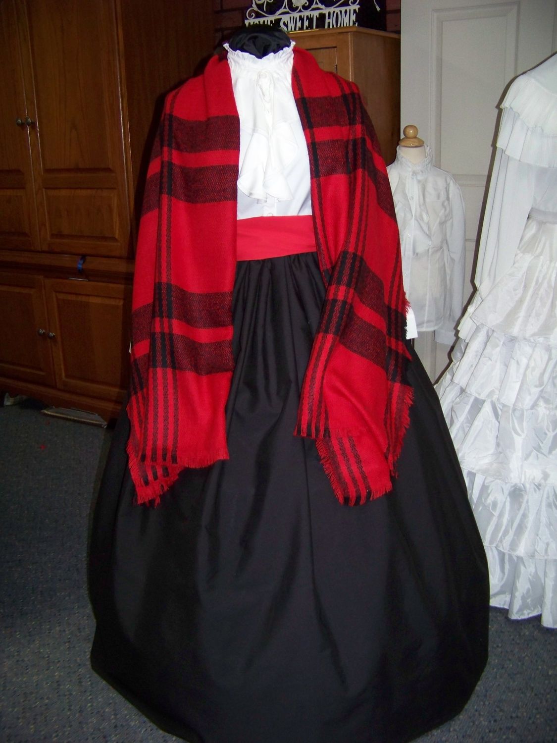 Dickens Costume Black Skirt with Red Sash and black and red rectangle Shawl one size fits most.