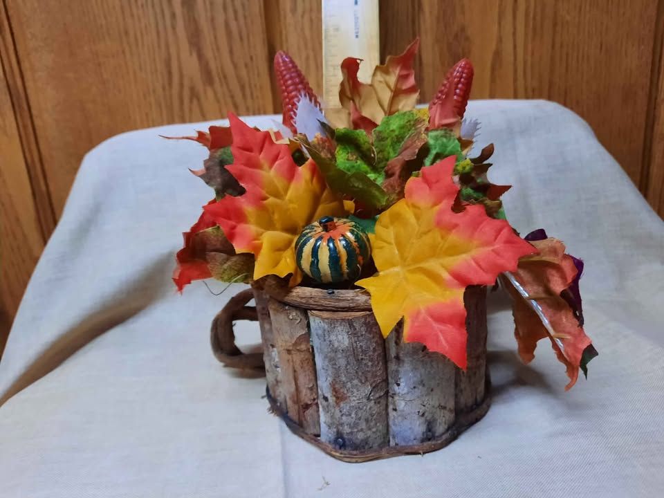 Wooden Watering can with fall silk flowers