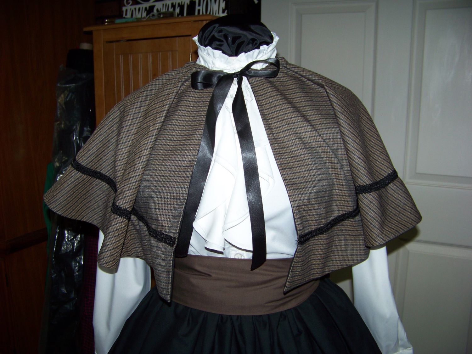 Ladies Dickens Fair costume Long drawstring Black cotton blend skirt, Cape is black and Tan small plaid with black braid one size fits most with Tan sash