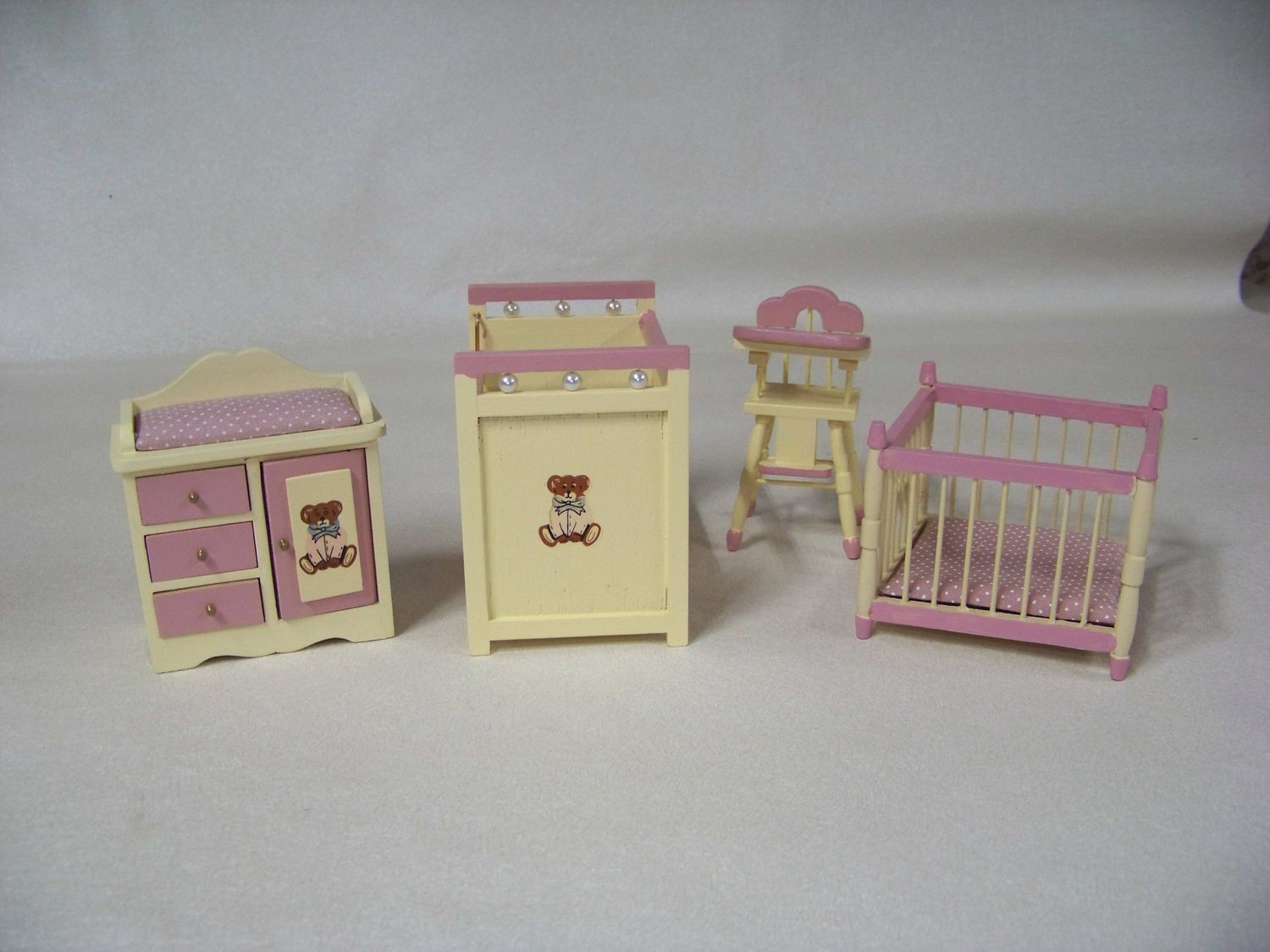 Vintage 1990s NOS miniature baby changing table, Bed, Playpen, Highchair w/bear on front pink and yellow painted with drawers that open.