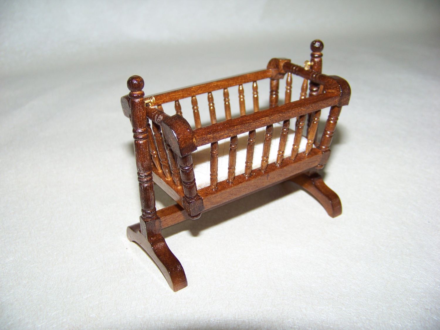 Vintage 1990s NOS miniature baby Bed Swing Cradle Honey wood stained with bedding.