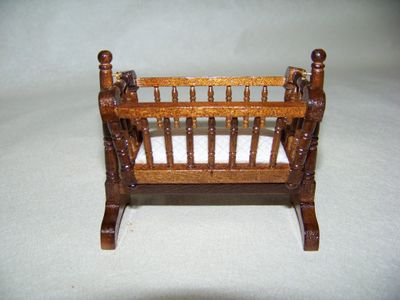 Vintage 1990s NOS miniature baby Bed Swing Cradle Honey wood stained with bedding.