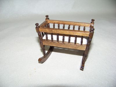 Vintage 1990s NOS miniature baby Bed or Rocking Cradle Honey wood stained with bedding.