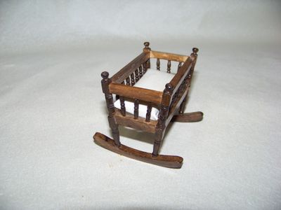 Vintage 1990s NOS miniature baby Bed or Rocking Cradle Honey wood stained with bedding.