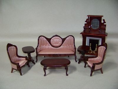Vintage 1980s NOS wooden Parlor furniture includes Fireplace, Pink Sofa, coffee table with Red Mahogany colored stain
