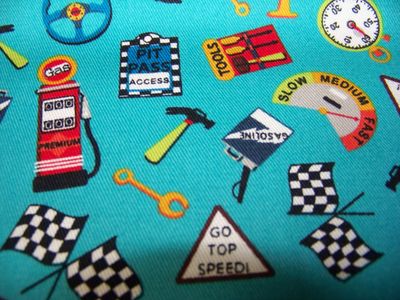 Car print Twill Fabric with Turquoise background Gas pumps, racing flags, pit pass, steering wheel, Tools, gasoline can great for boys room