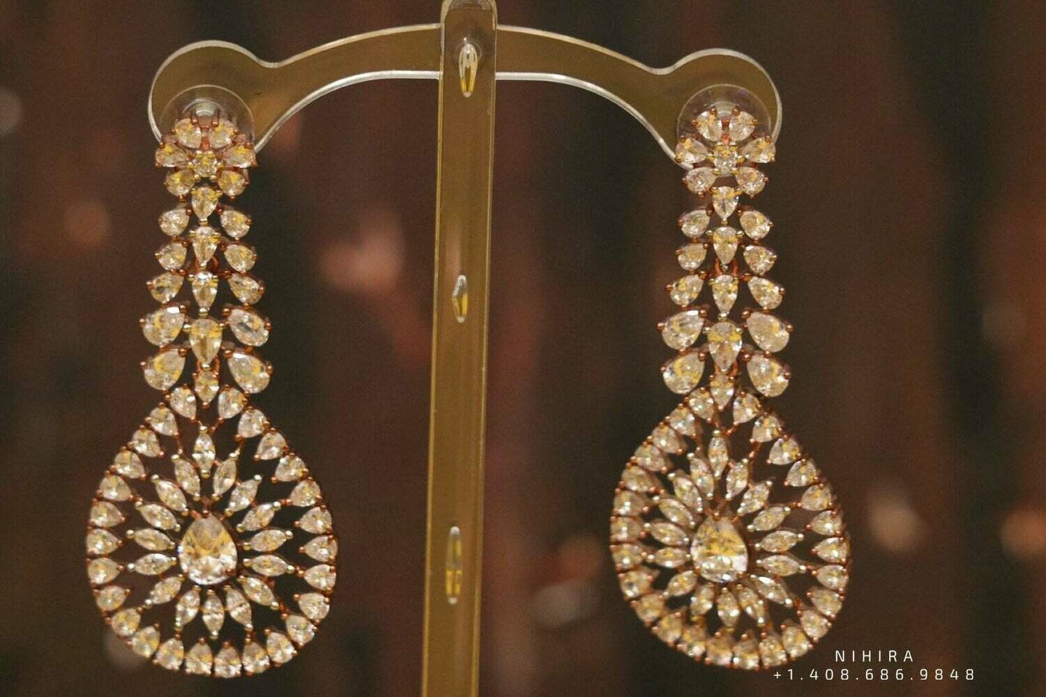 Diamond jhumka,big jhumka,swarovski,south sea pearl earring,party wear earrings,designer jewelry,hand picked jewelry,celebrity jewelry