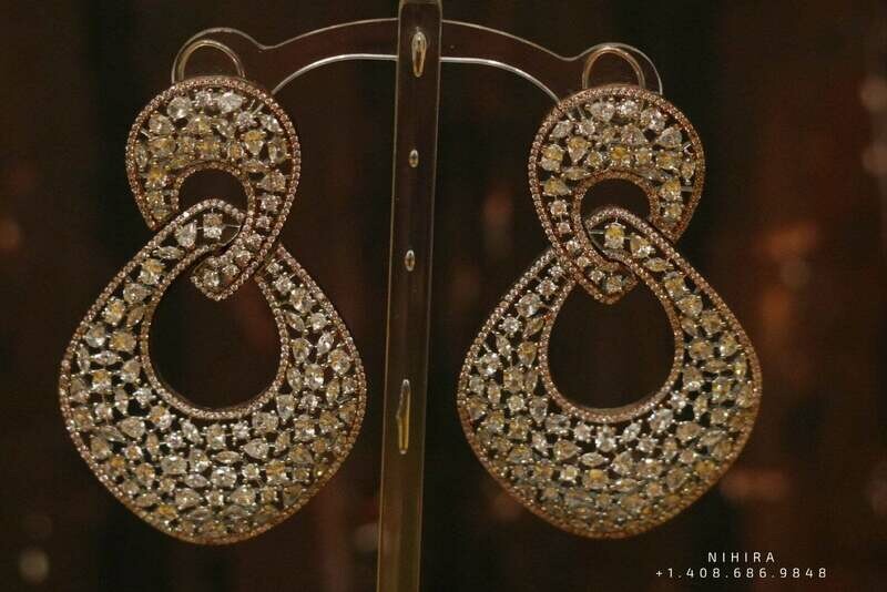 Diamond jhumka,big jhumka,swarovski,south sea pearl earring,party wear earrings,designer jewelry,hand picked jewelry,celebrity jewelry