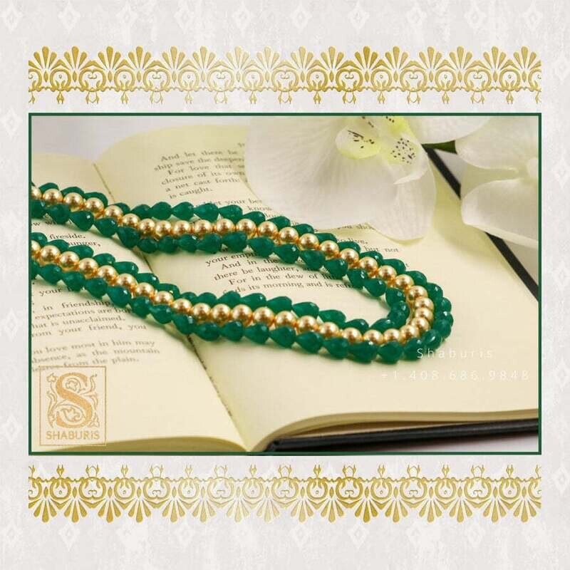 Multi layered beads south sea pearls emerald beads