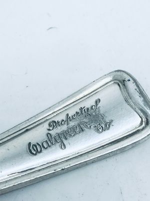 Anello “Property of Walgreen Co” antica posata