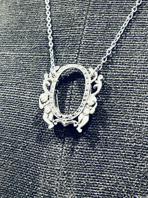 PENDENTE CORNICE PUTTI argento 800