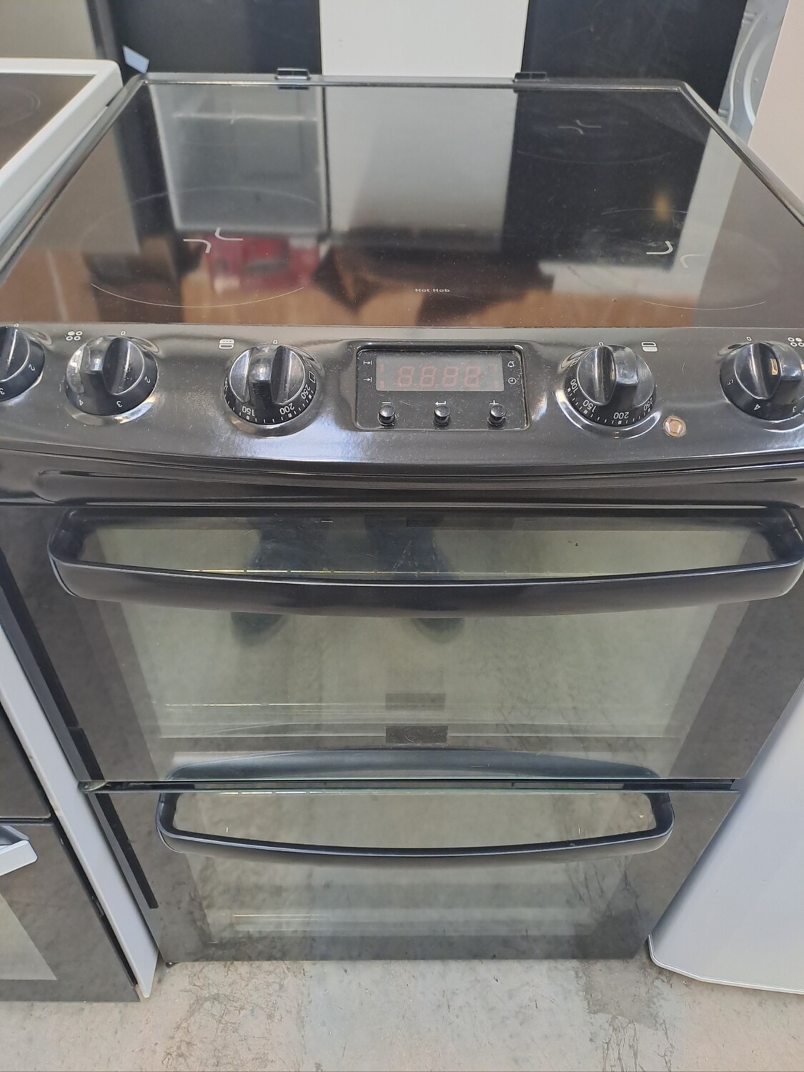 Zanussi ZCV662MNC 60cm Electric cooker Twin Cavity Double Oven Ceramic Hob - Black - Refurbished + 6 month guarantee. This item is located in our Whitby Road Shop 