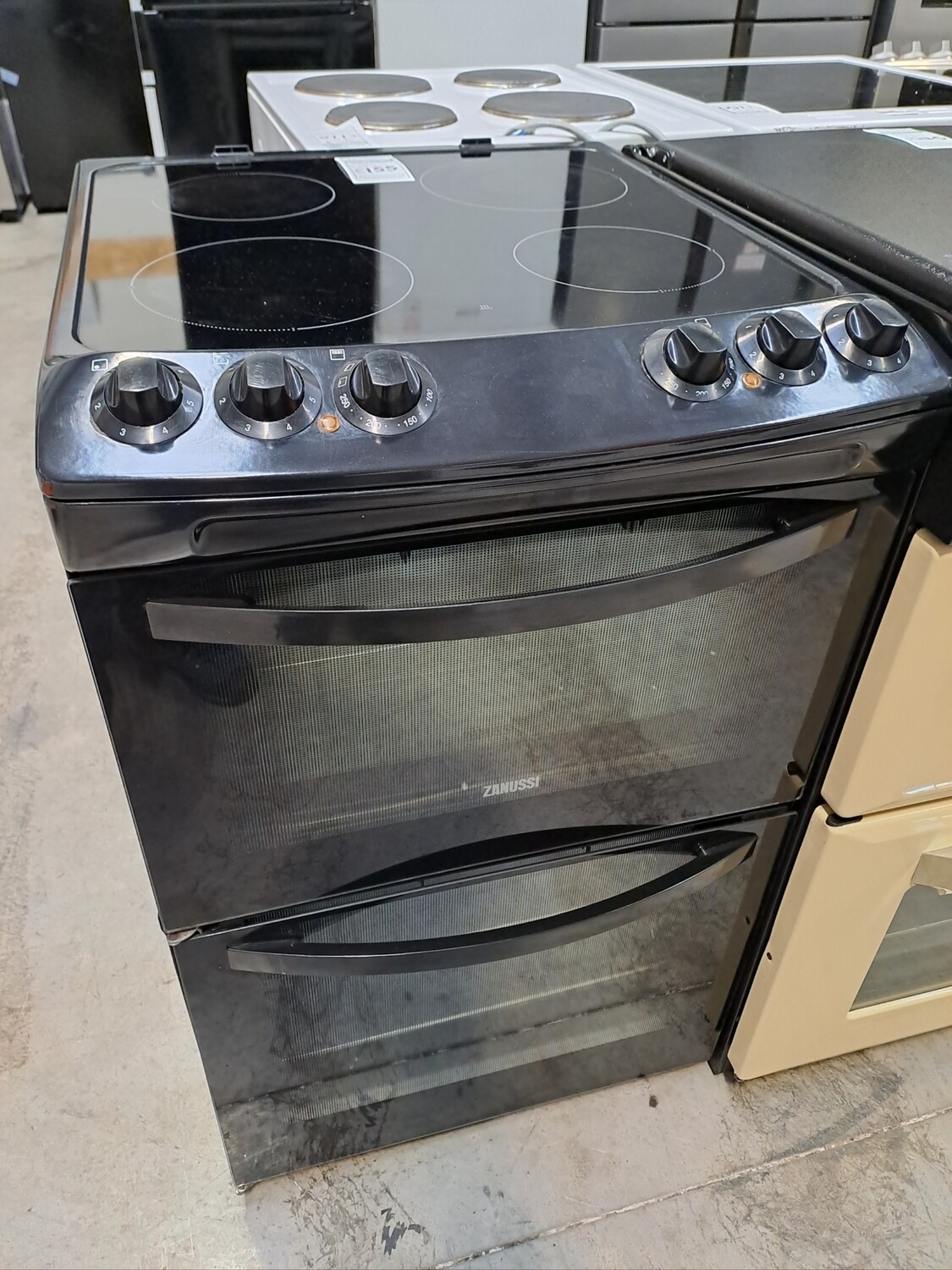 Zanussi ZCV46000BA 55cm Electric cooker Twin Cavity Double Oven Ceramic Hob - Black  - Refurbished + 6 month guarantee. This item is located in our Whitby Road 