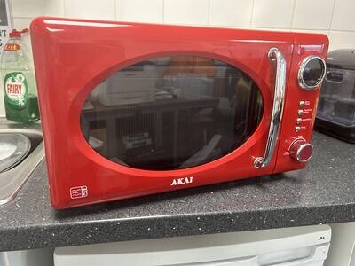 Red AKAI 700W - C Microwave - Refurbished
