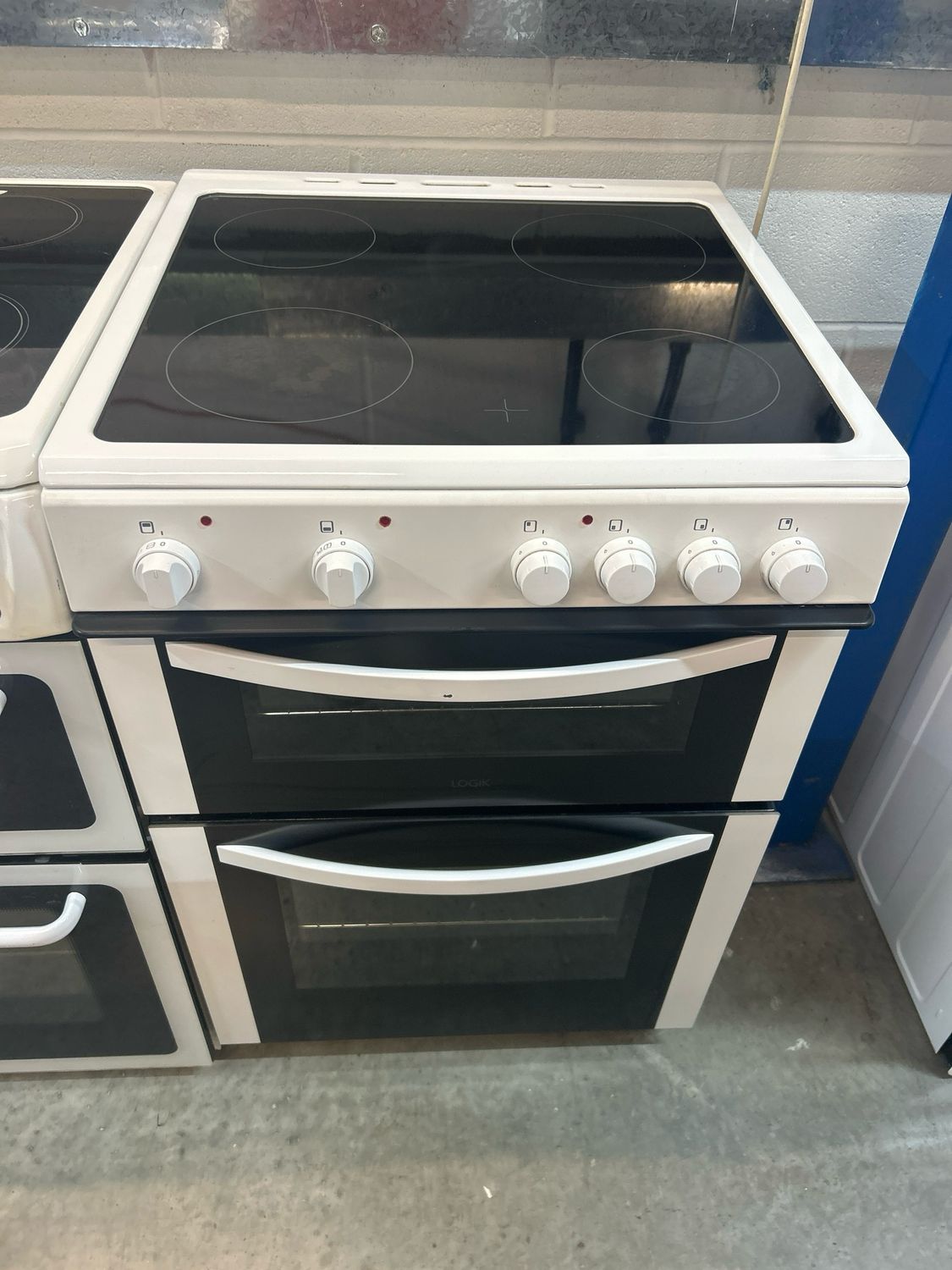 Logik 60cm Electric cooker twin Cavity White