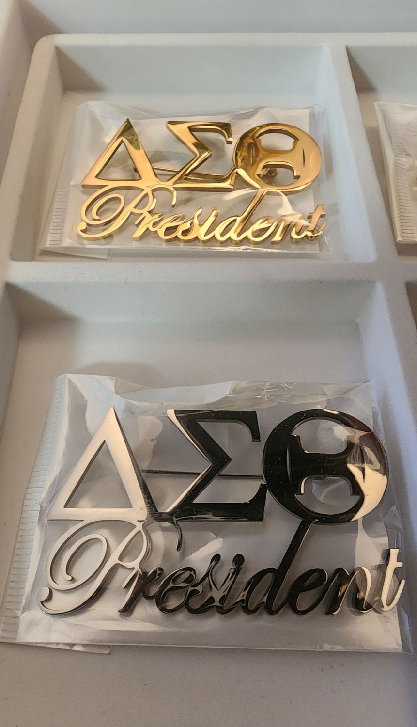 Delta Symbol Script President