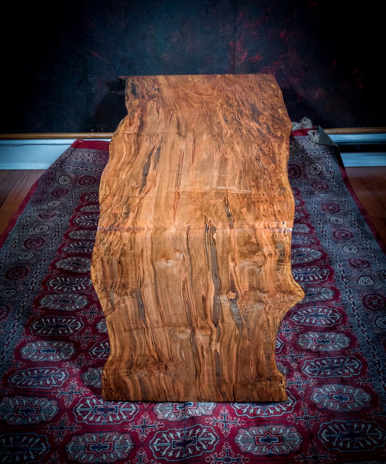 Stunning Ambrosia Maple Waterfall Coffee Table - Handcrafted with Seamless Leg Design and High-Gloss Finish"  Product Description