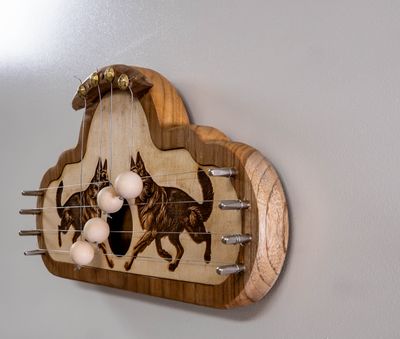 Handcrafted Wooden Door Harp with Laser-Engraved Dogs Design Handcrafted Wooden Door Harp with Laser-Engraved Dogs Design