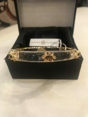 Bracelet Cristina Sabatini Lucite fleur de Lys Bracelet Cristina Sabatini Lucite fleur de Lys