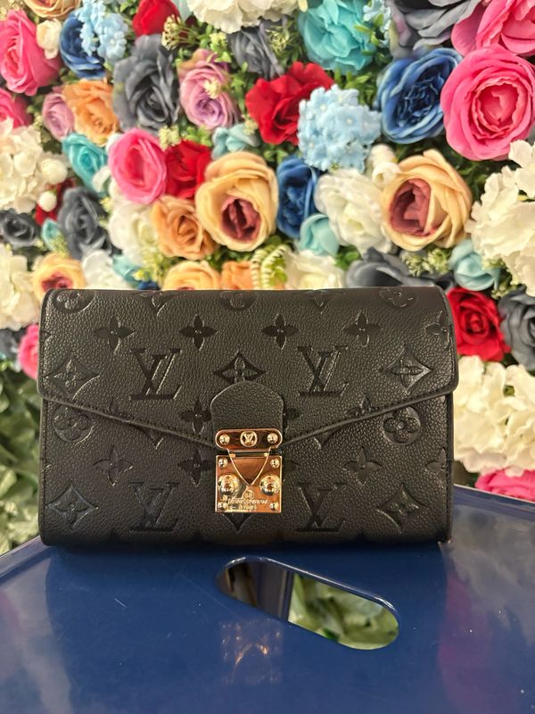 Inspired embossed crossbody