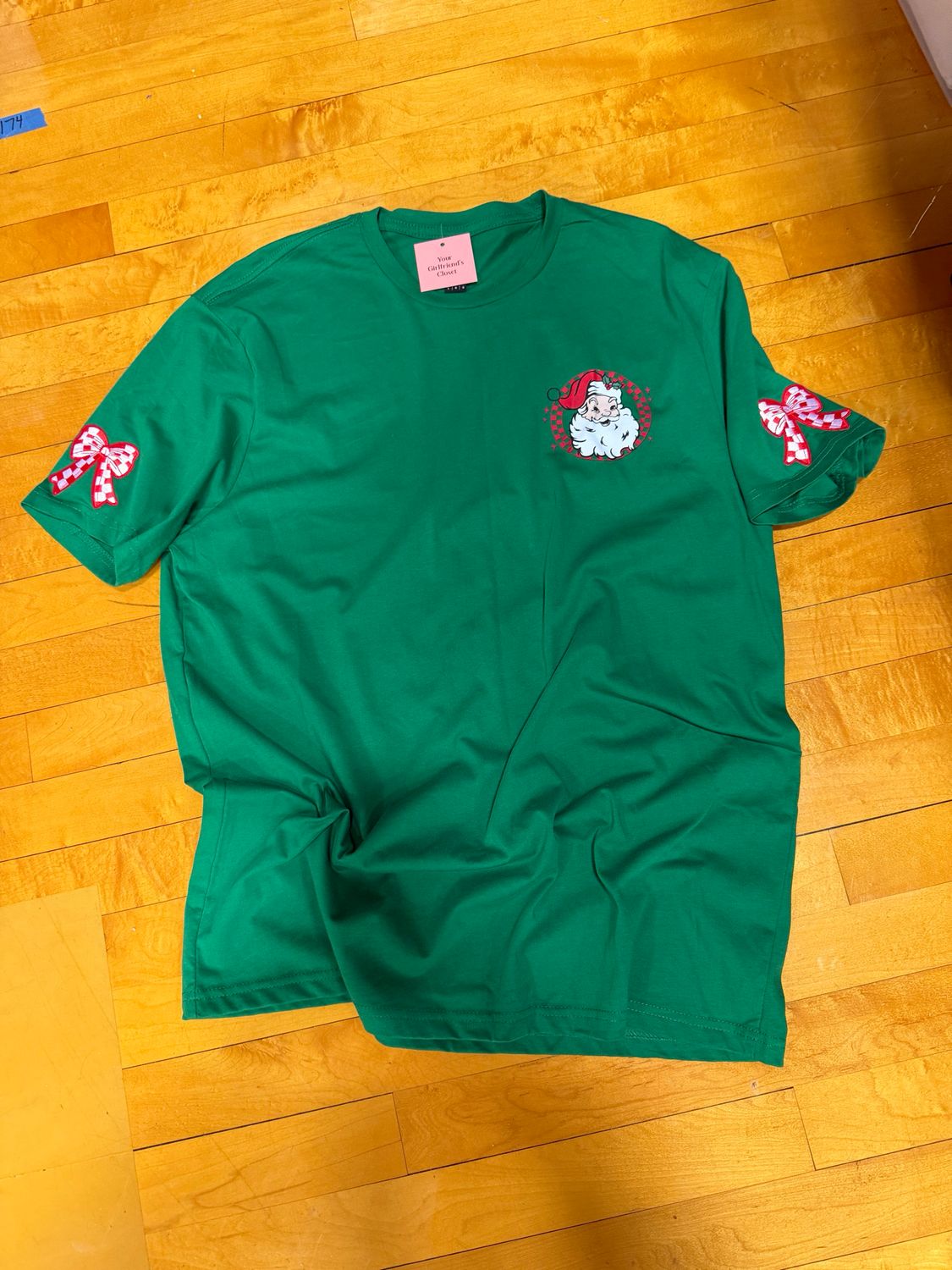 Green Santa tee with bow on sleeve large