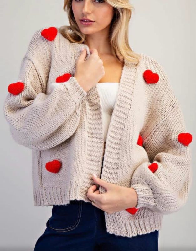 Beige cardigan w/ floating hearts