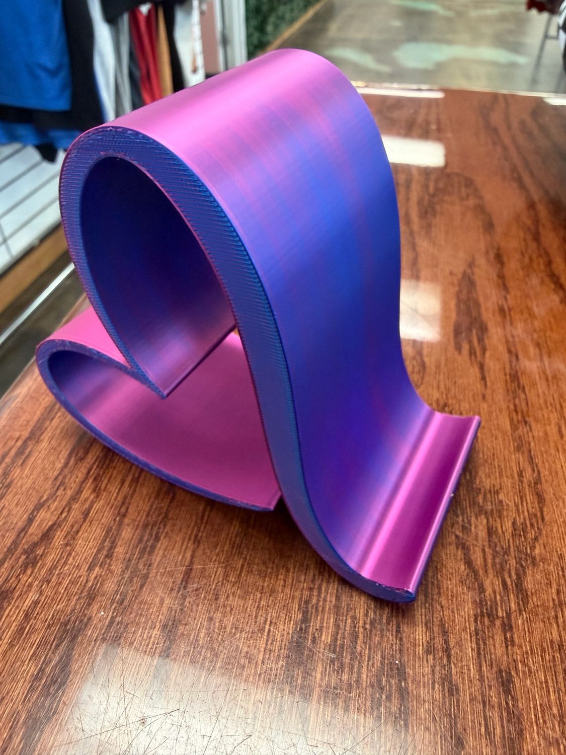 Iridescent heart phone holder