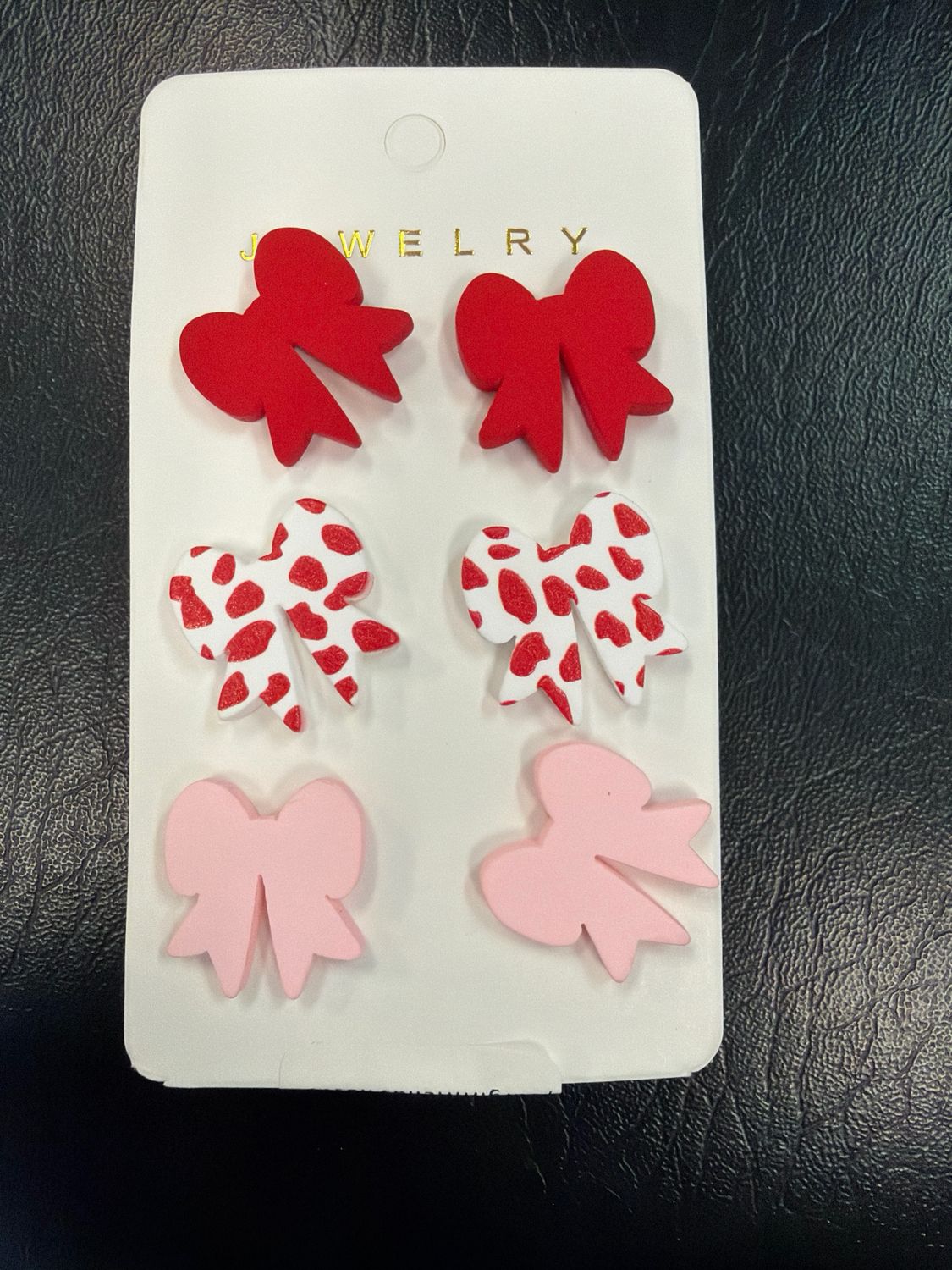 3 pair bow earrings pink red