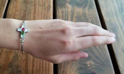 Real Rose Cross Wire Bracelet , White Background.