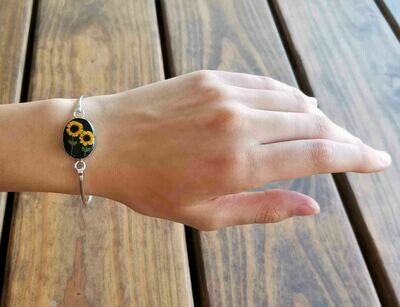 Sunflowers, Medium Oval Bracelet, Black Background.