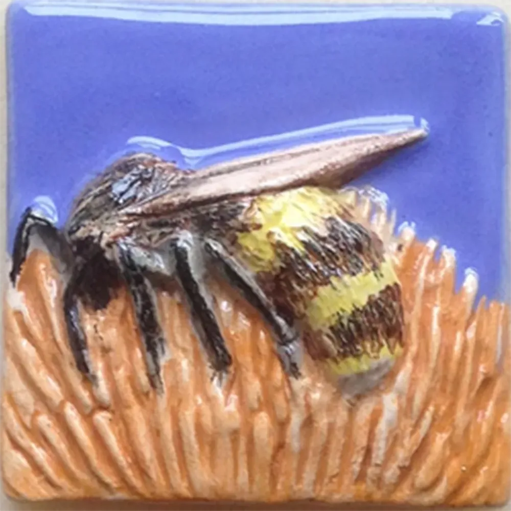 Feature Tile titled 'Bee on Flower 227' in orange and blue