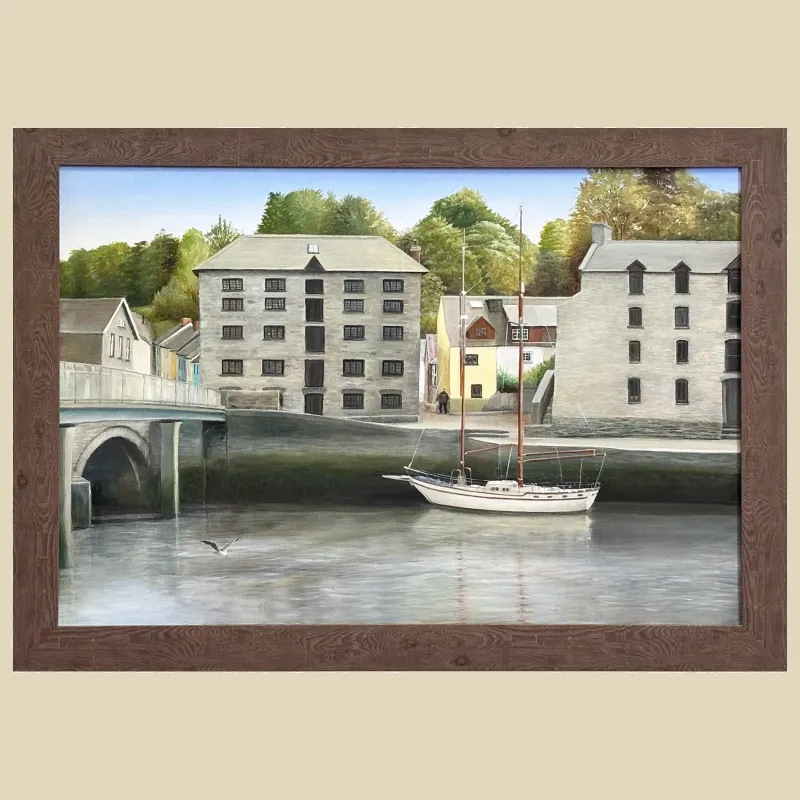 Cardigan quay showing the old granary building and the boat that was moored there for a couple of years