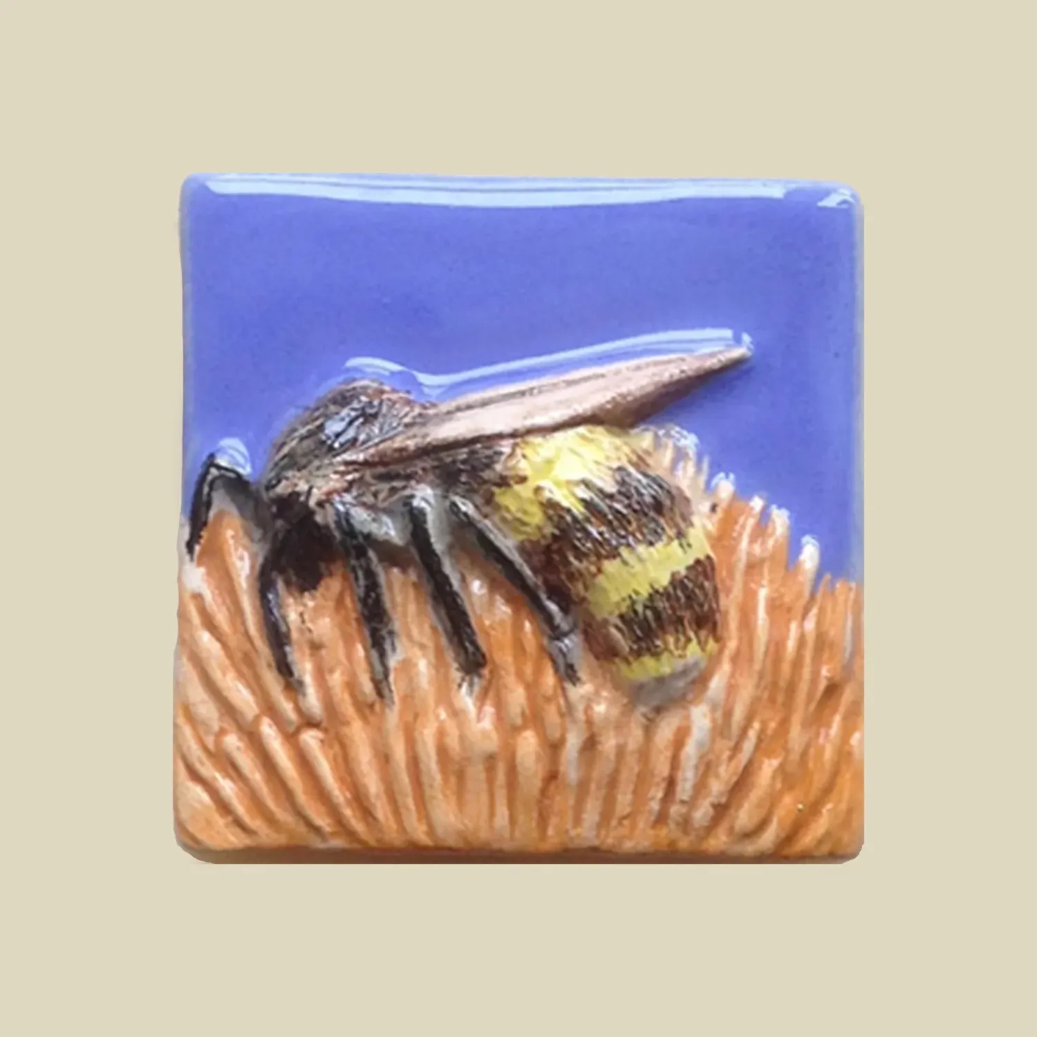 Feature Tile titled 'Bee on Flower 227' in orange and blue