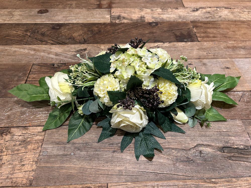 Bloemstuk in zijden 25x40 cm oranje Bloemstuk in zijden 25x40 cm oranje