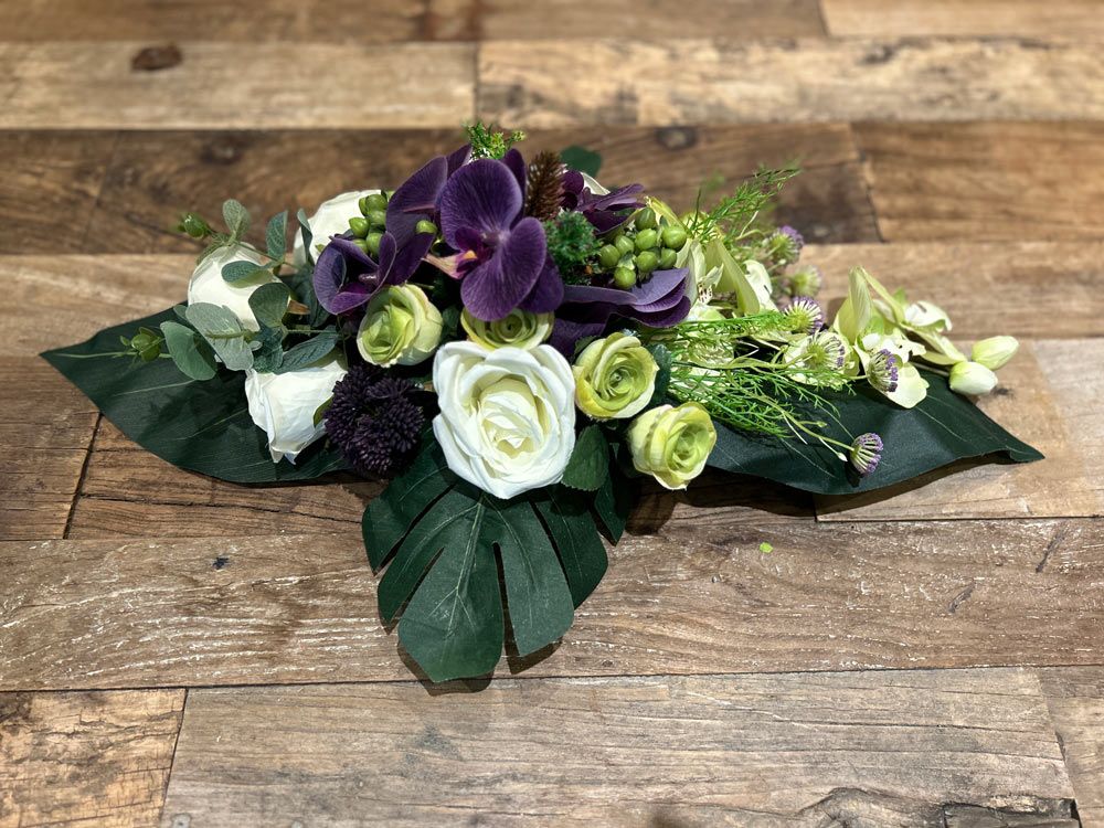 Bloemstuk in zijden 25x55 cm Bloemstuk in zijden 25x55 cm