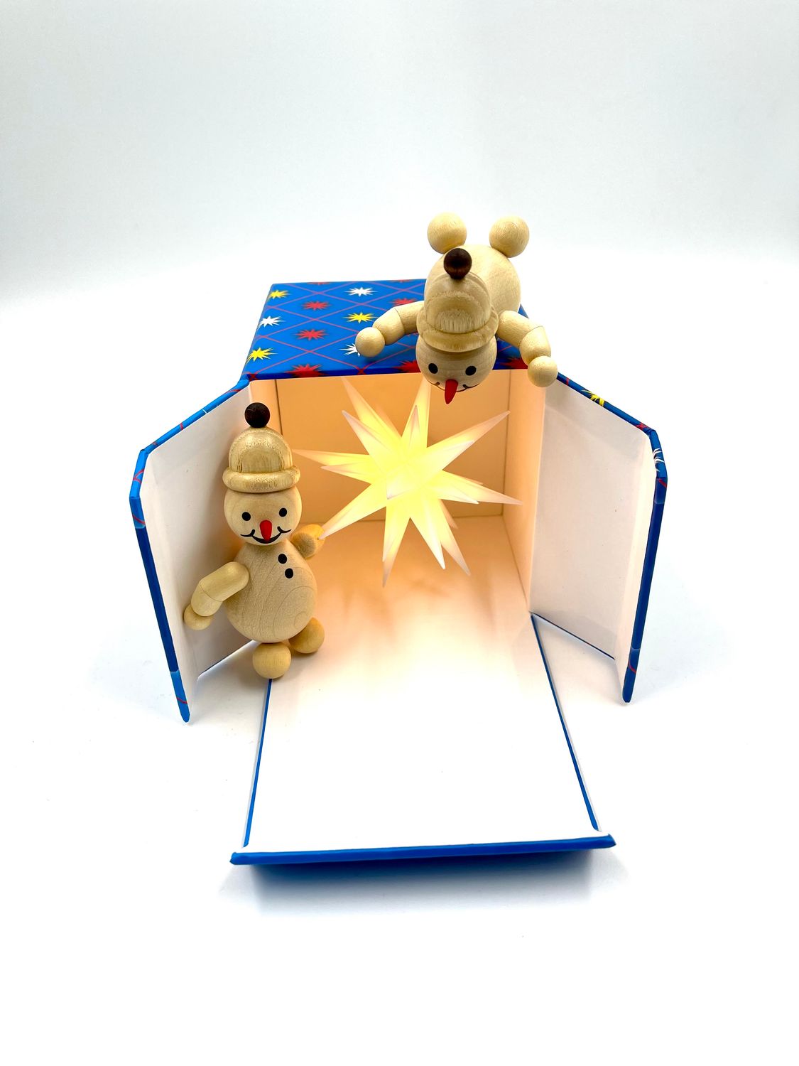 Schöne Bescherung-verspielte Szene mit zwei charmanten Schneemännern & einem Herrenhuter Miniaturstern.