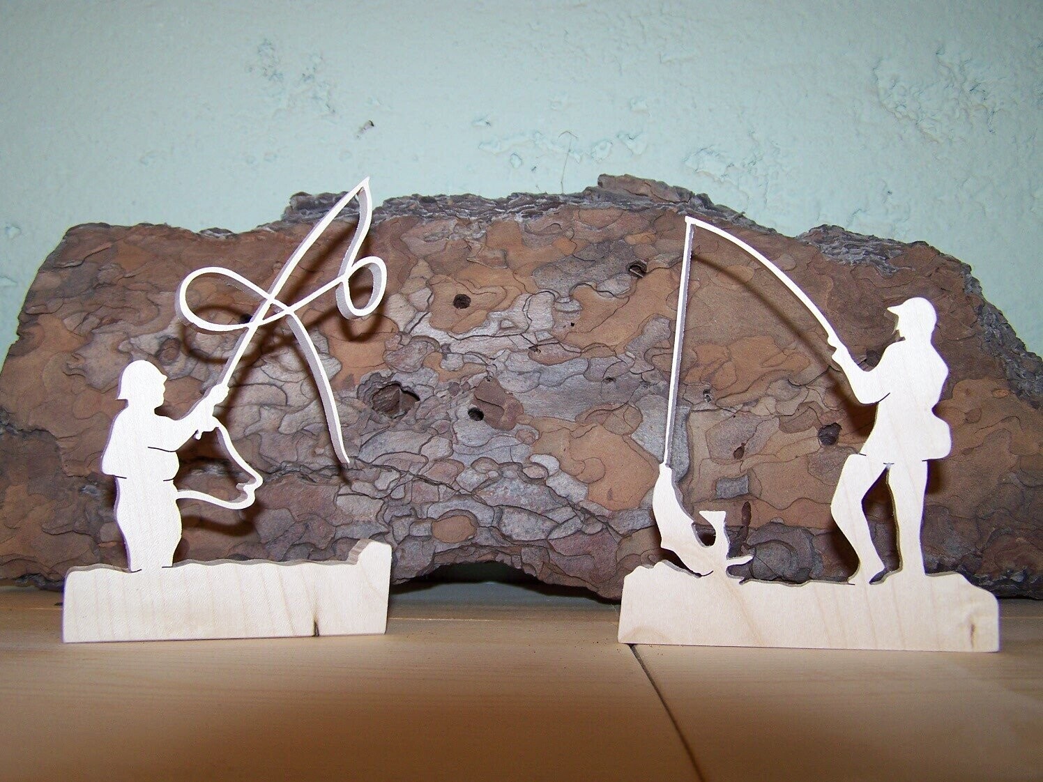 Figurine de collection en bois - La passion de la pêche