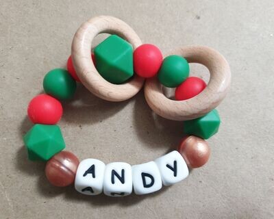 Personalised Silicone Teething Toy Baby Rattle With Wooden Rings - Xmas Edition