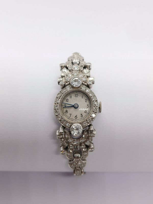 Antique Ladies Platinum & White Gold Diamond Set Cocktail Watch with mechanical movement. (Pre-owned)