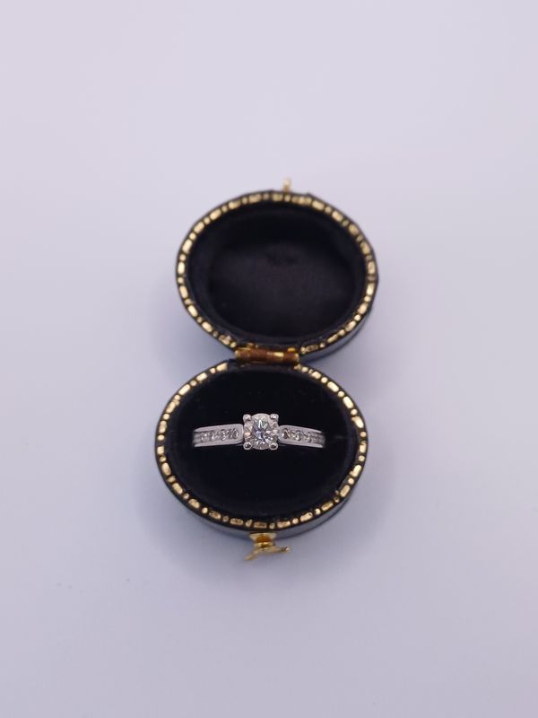 Stunning Platinum Diamond Solitare with Diamond Set Shoulders