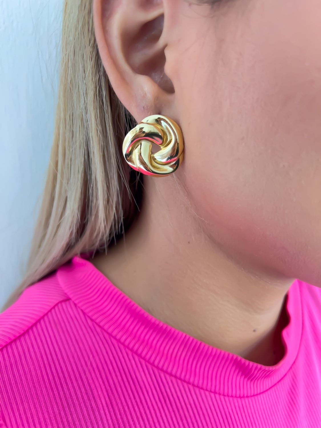 Aretes entrelazados 
