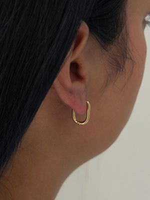 Arracaditas ovalo liso , acero dorado 