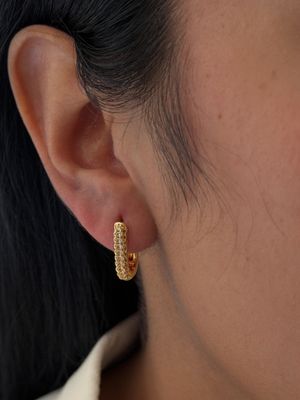 Arracadas ovalo zirconias , chapa de oro