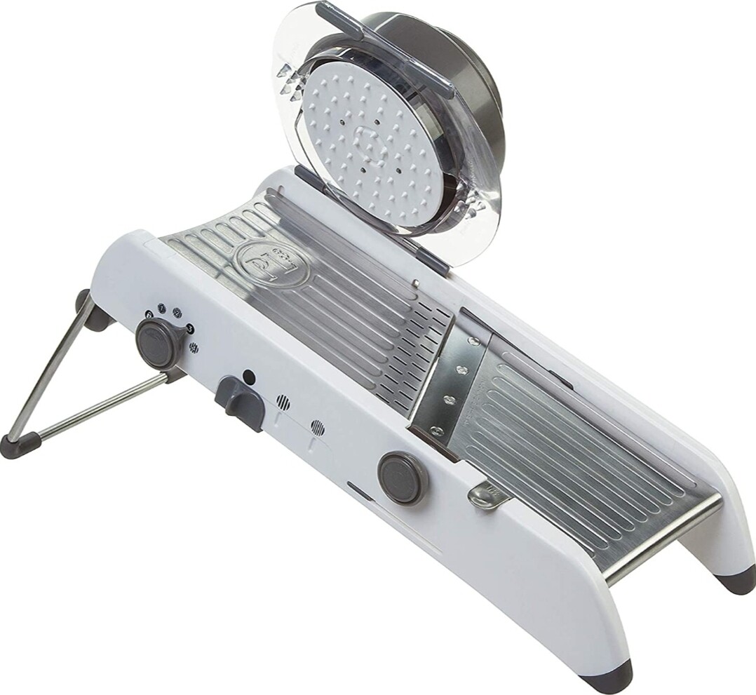 Progressive vegetable mandoline slicer