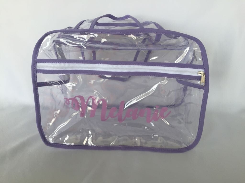 MALETIN PLASTICO CON RIBETE LILA